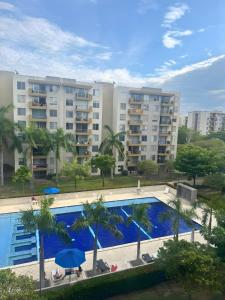 Бассейн в Apartamento Vacacional en Hacienda Peñalisa Ceiba Ricaurte или поблизости