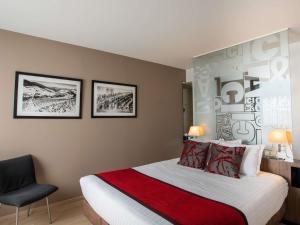 Postel nebo postele na pokoji v ubytování Mercure Villefranche-sur-Saône