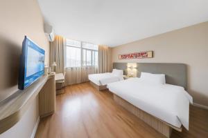 Μια τηλεόραση ή/και κέντρο ψυχαγωγίας στο Hanting Hotel Shanghai Songjiang Sheshan