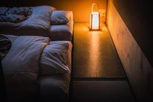 Rúm í herbergi á Ohanabo