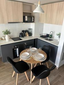 Nhà bếp/bếp nhỏ tại Increible departamento cercano al movistar arena +10 ảnh