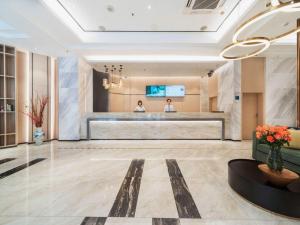 Khu vực ghế ngồi tại City Comfort Inn Zhongshan Lihe Square Walmart Branch