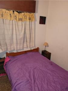 Giường trong phòng chung tại Los Haroldos