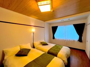 Postel nebo postele na pokoji v ubytování Casa G,S, - Vacation STAY 81451v + 26 fotografií