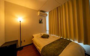 Postel nebo postele na pokoji v ubytování Casa G,S, - Vacation STAY 52558v + 25 fotografií