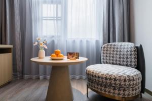 Posezení v ubytování Orange Hotel Shenzhen Futian Convention and Exhibition Center