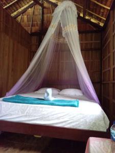 Ένα ή περισσότερα κρεβάτια σε δωμάτιο στο " Wobbegong Raja Ampat " +31 φωτογραφίες