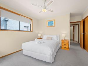 Postel nebo postele na pokoji v ubytování Beachfront