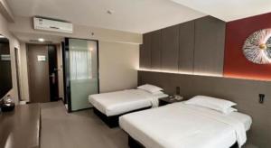 Ένα ή περισσότερα κρεβάτια σε δωμάτιο στο Jinjiang Inn Select Xi'an Hongmiaopo East Daxing Road +64 φωτογραφίες