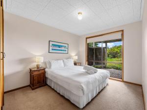 Postel nebo postele na pokoji v ubytování Waters Edge
