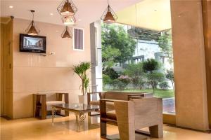 Μια τηλεόραση ή/και κέντρο ψυχαγωγίας στο Borrman Hotel Liuzhou Ma'anshan Park Gubu Shopping Mall