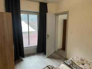 Postel nebo postele na pokoji v ubytování Flying Hirsch + 2 fotografie