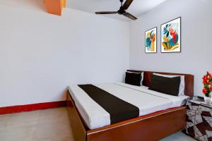 Una cama o camas en una habitación de Hotel O Swami Vivekananda University Kolkata