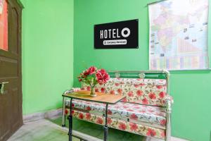 Una cama o camas en una habitación de Hotel O Swami Vivekananda University Kolkata