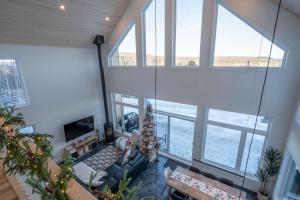 an aerial view of a living room with windows at Chalet Le Valkea - Spa & Mountain in Saint Come +71 photos