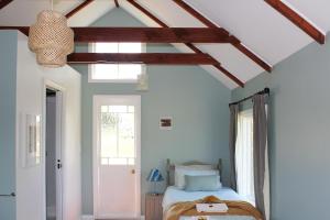 Ένα ή περισσότερα κρεβάτια σε δωμάτιο στο The Hop Inn