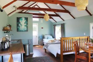 Ένα ή περισσότερα κρεβάτια σε δωμάτιο στο The Hop Inn