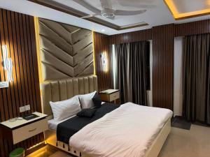 Postel nebo postele na pokoji v ubytování the best stay hotel in peshawar + 31 fotografií