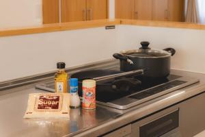 松本Sa one ko松本的厨房里炉灶上的锅 更多17张照片