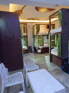 Una cama o camas en una habitación de Frazyone Hostel