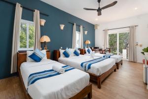 Postel nebo postele na pokoji v ubytování Samaya Boutique & Cuisine + 52 fotografií