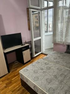 Ένα ή περισσότερα κρεβάτια σε δωμάτιο στο CVETI Haus