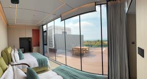 Postel nebo postele na pokoji v ubytování 星月文旅民宿 + 61 fotografií