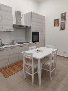 Køkken eller tekøkken på affittacamere GOLD + 8 billeder