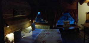 Postel nebo postele na pokoji v ubytování BAITA Ancienne Bergerie