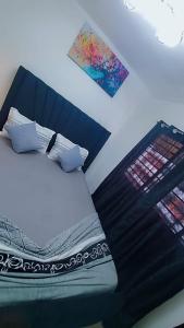 En eller flere senge i et værelse på Sunshine paradise + 13 billeder