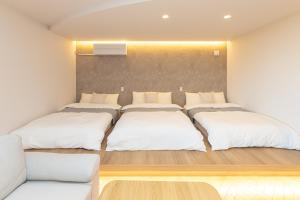 Postel nebo postele na pokoji v ubytování Rush Awaji Canariya - Seaside Holiday Home - Self Check-In Only