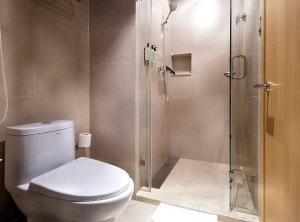 Koupelna v ubytování Orange Hotel Hangzhou Binjiang University Town + 16 fotografií