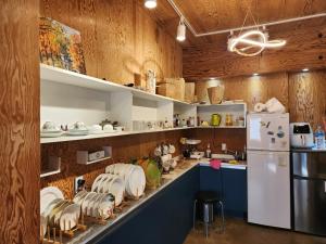 Kuchyň nebo kuchyňský kout v ubytování Namuae