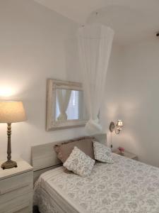 En eller flere senge i et værelse på affittacamere GOLD