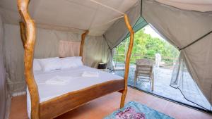 Ένα ή περισσότερα κρεβάτια σε δωμάτιο στο Glamping in the sky