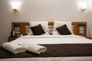 En eller flere senge i et værelse på Sea View Beach Resort