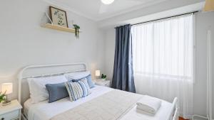 Ένα ή περισσότερα κρεβάτια σε δωμάτιο στο Riverside Retreat