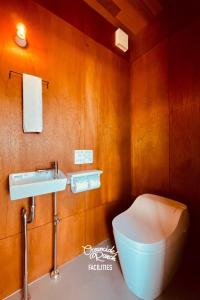a bathroom with a toilet and a sink at OceansideRanch Miyazaki in Miyazaki +50 photos