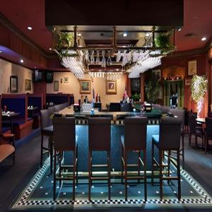 a bar in a restaurant with bar stools at Valley Forge Casino Resort in Betzwood