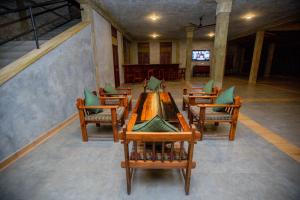 Una televisión o centro de entretenimiento en The Coastal Village Cabanas