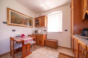Nhà bếp/bếp nhỏ tại Coromiga le Stelle