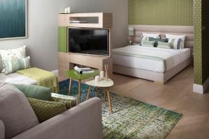 Posteľ alebo postele v izbe v ubytovaní Brill Budapest Apartments 2