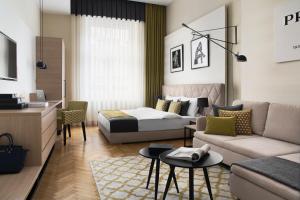 Posteľ alebo postele v izbe v ubytovaní Brill Budapest Apartments 2