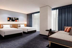 Una cama o camas en una habitación de Comfort Inn Nagoya Sakae 23 fotos más