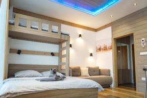 Ένα ή περισσότερα κρεβάτια σε δωμάτιο στο Apartmán Amelka Vysoké Tatry