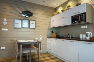 Η κουζίνα ή μικρή κουζίνα στο Apartmán Amelka Vysoké Tatry +40 φωτογραφίες