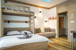 Ένα ή περισσότερα κρεβάτια σε δωμάτιο στο Apartmán Amelka Vysoké Tatry