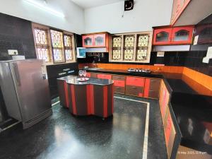 Kuchyň nebo kuchyňský kout v ubytování Kinaara Homestay Malpe Where The Coast Feels Like Home + 5 fotografií