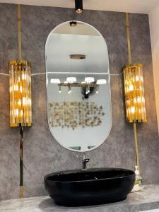 Phòng tắm tại Nayanas Regal Arcadia Karyavattom +19 ảnh