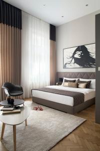 Posteľ alebo postele v izbe v ubytovaní Brill Budapest Apartments 2